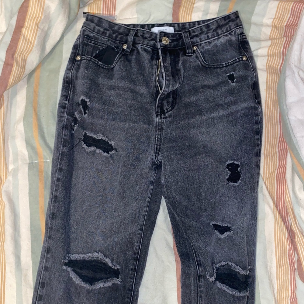 Forever 21 black ripped jeans.